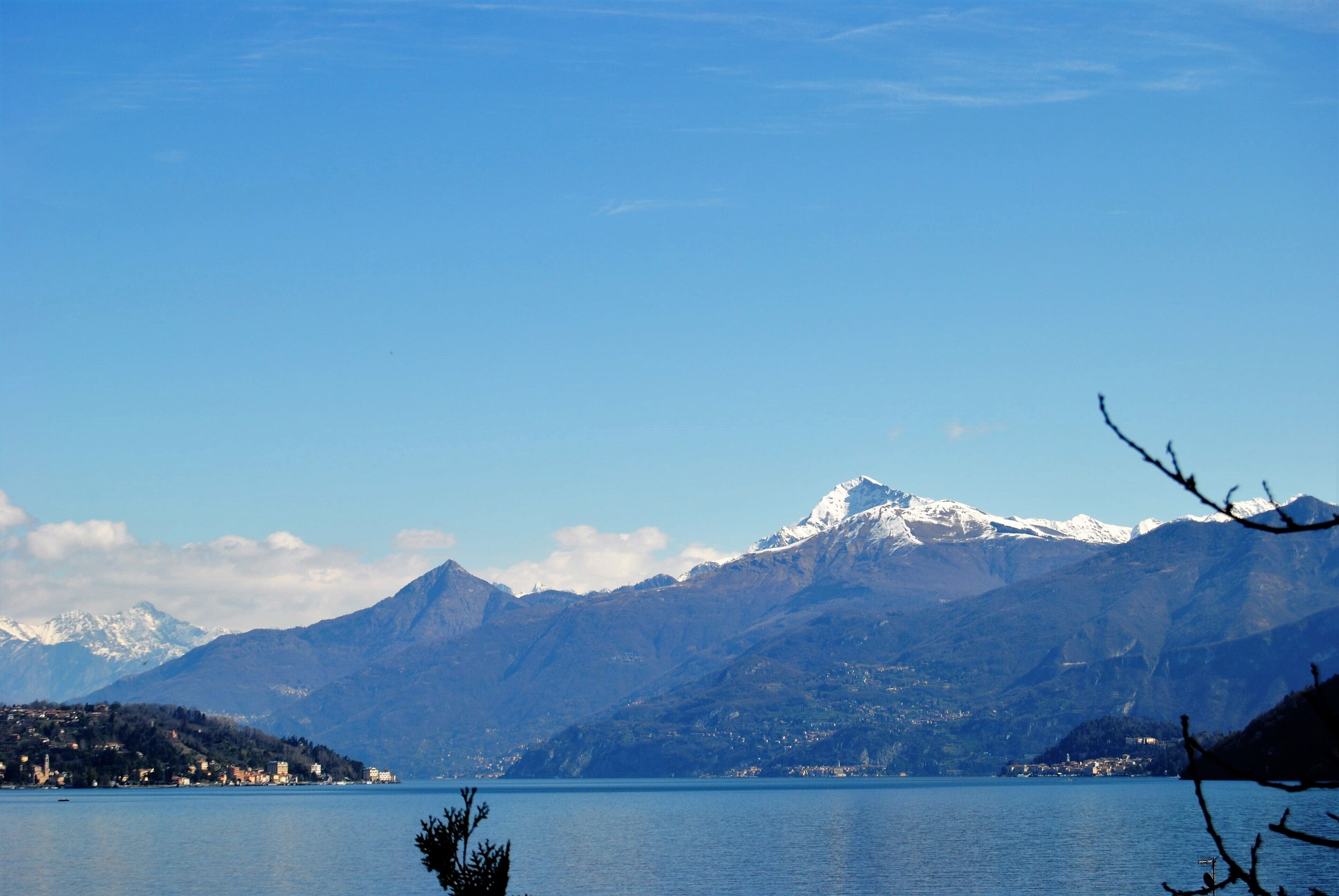 A lake with mountains in the background.