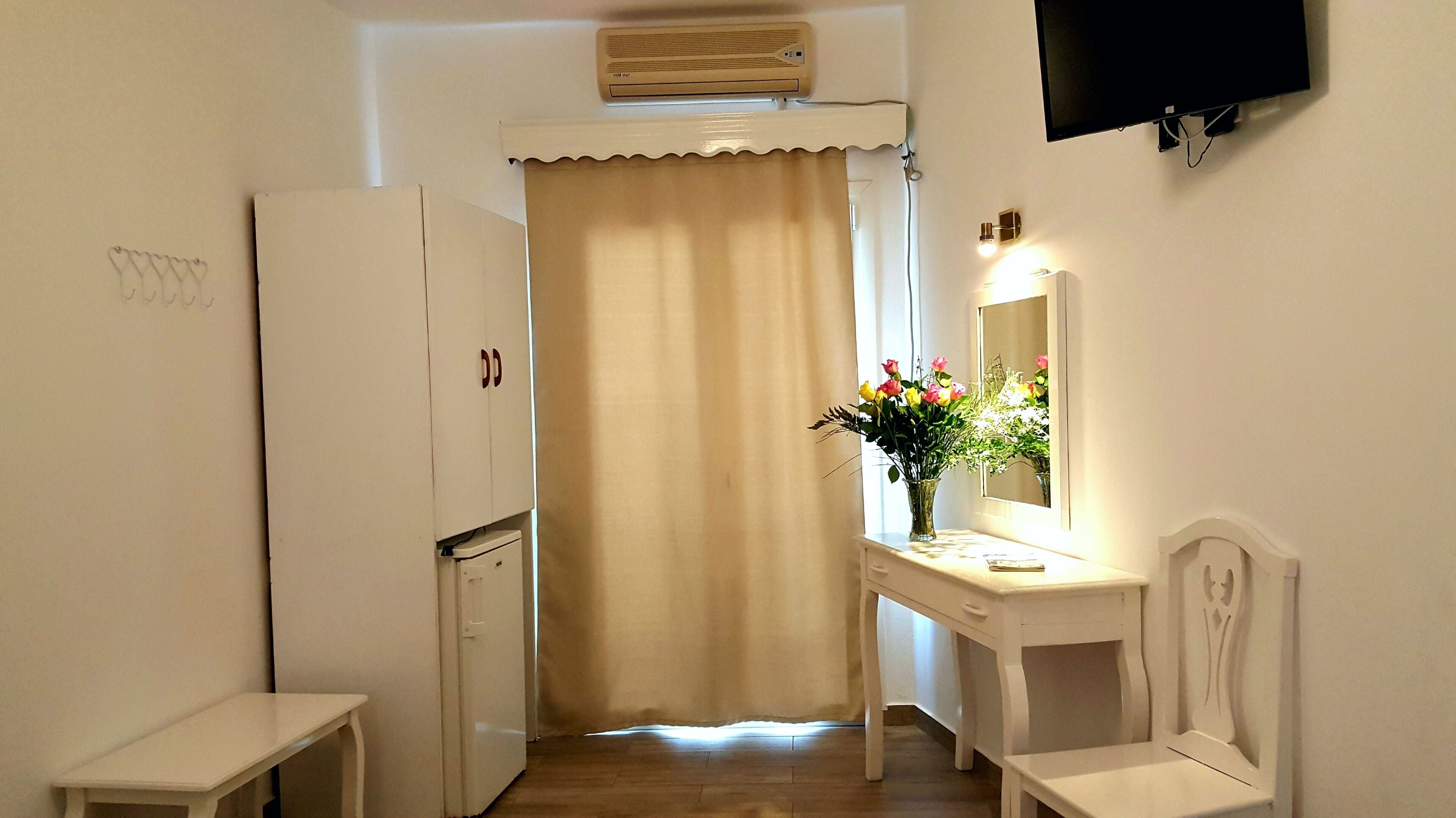 triple room, balcony | 1 bedroom, individually decorated, individually furnished