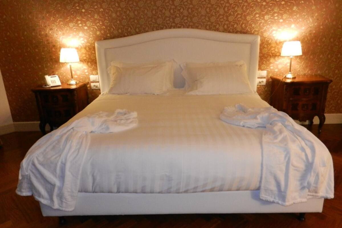 premium bedding, minibar, in-room safe, individually decorated