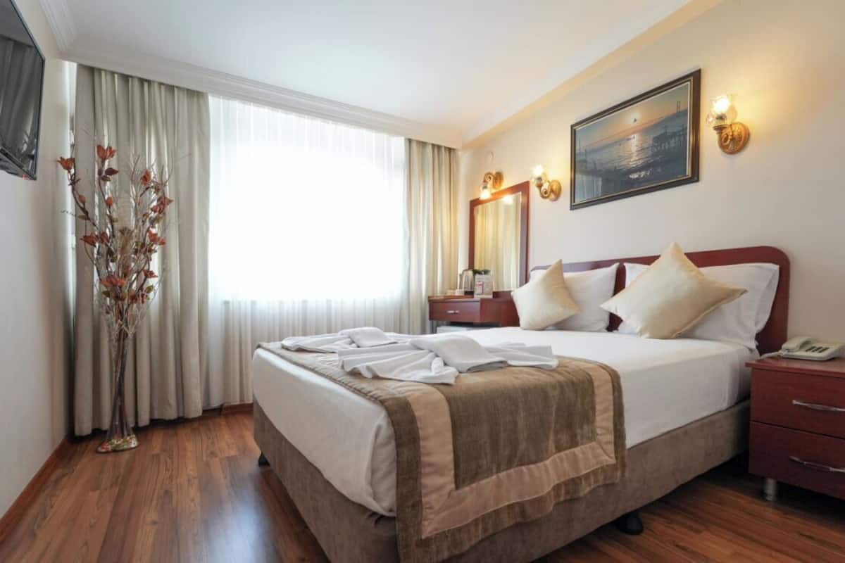 Premium bedding, pillowtop beds, minibar, in-room safe