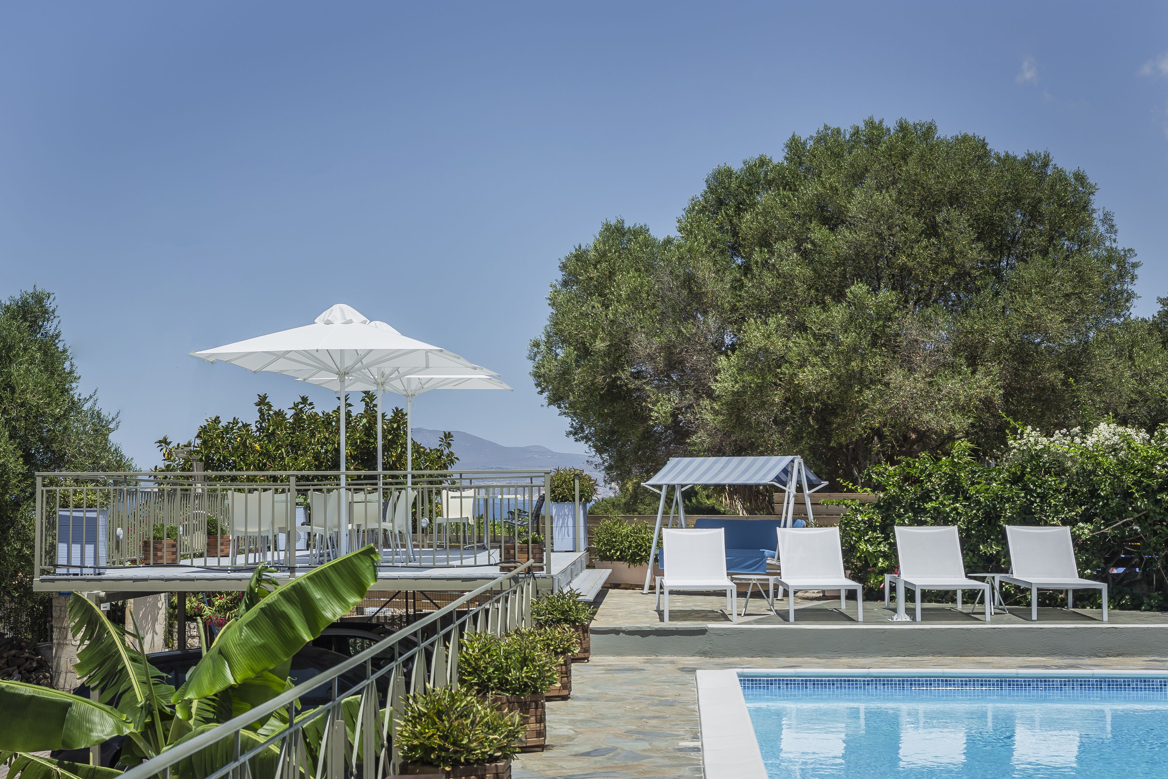 seasonal outdoor pool, open 9:00 am to 8:00 pm, pool umbrellas