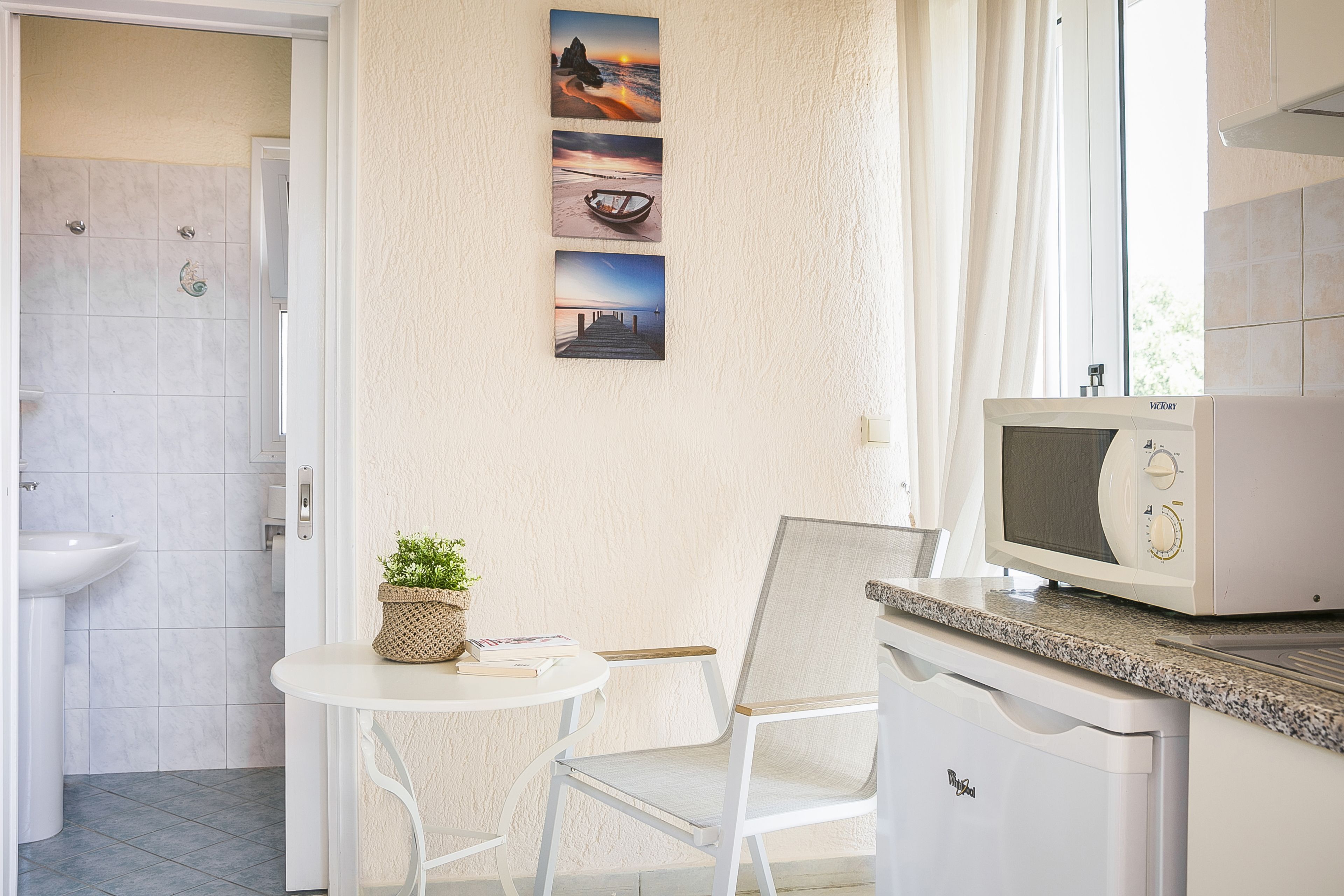 superior double room, 1 bedroom, sea view | down duvets, in-room safe, soundproofing, iron/ironing board