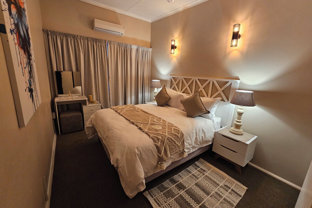 Comfort Suite | Premium bedding, down comforters, Select Comfort beds, in-room safe