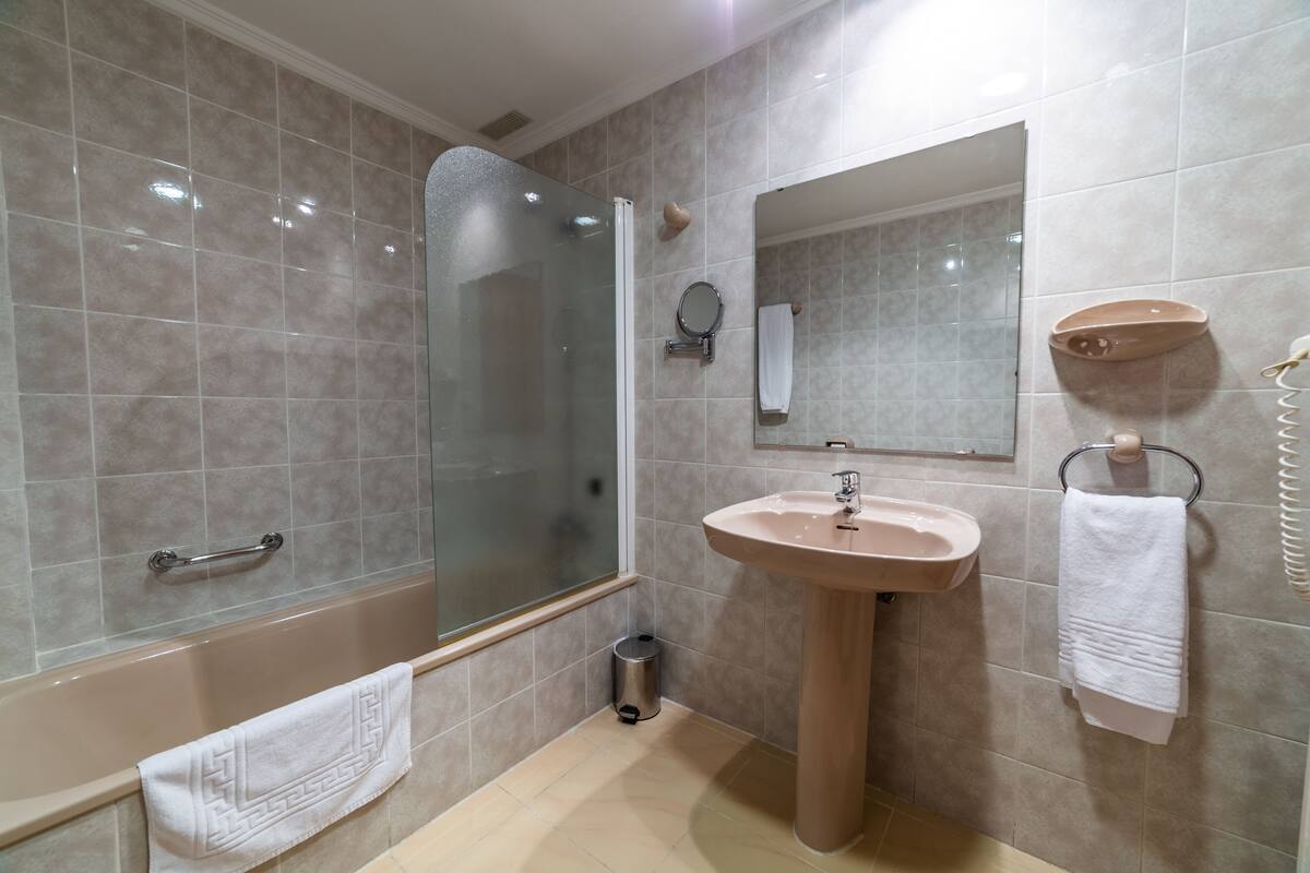 free toiletries, hair dryer, bidet, towels