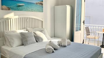 Double or Twin Room, Partial Sea View | 1 bedroom, desk, blackout drapes, soundproofing