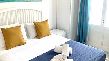 Double or Twin Room, Partial Sea View | 1 bedroom, desk, blackout drapes, soundproofing