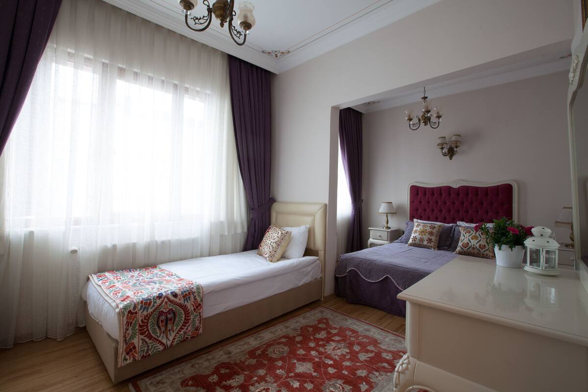 Family Apartment, 2 Bedrooms, 2 Bathrooms, Kitchen, Garden View | Literie de qualité, lit avec matelas Tempur-Pedic, minibar