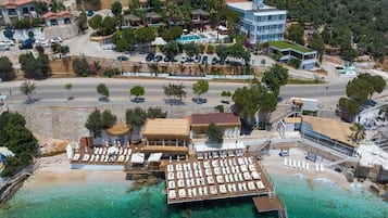 Private beach, snorkeling, beach bar, fishing