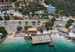 Private beach, snorkeling, beach bar, fishing