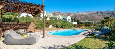 Outdoor pool, sun loungers