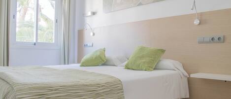 Standard Apartment, 1 Bedroom, Balcony | 1 bedroom, desk, blackout curtains, iron/ironing board