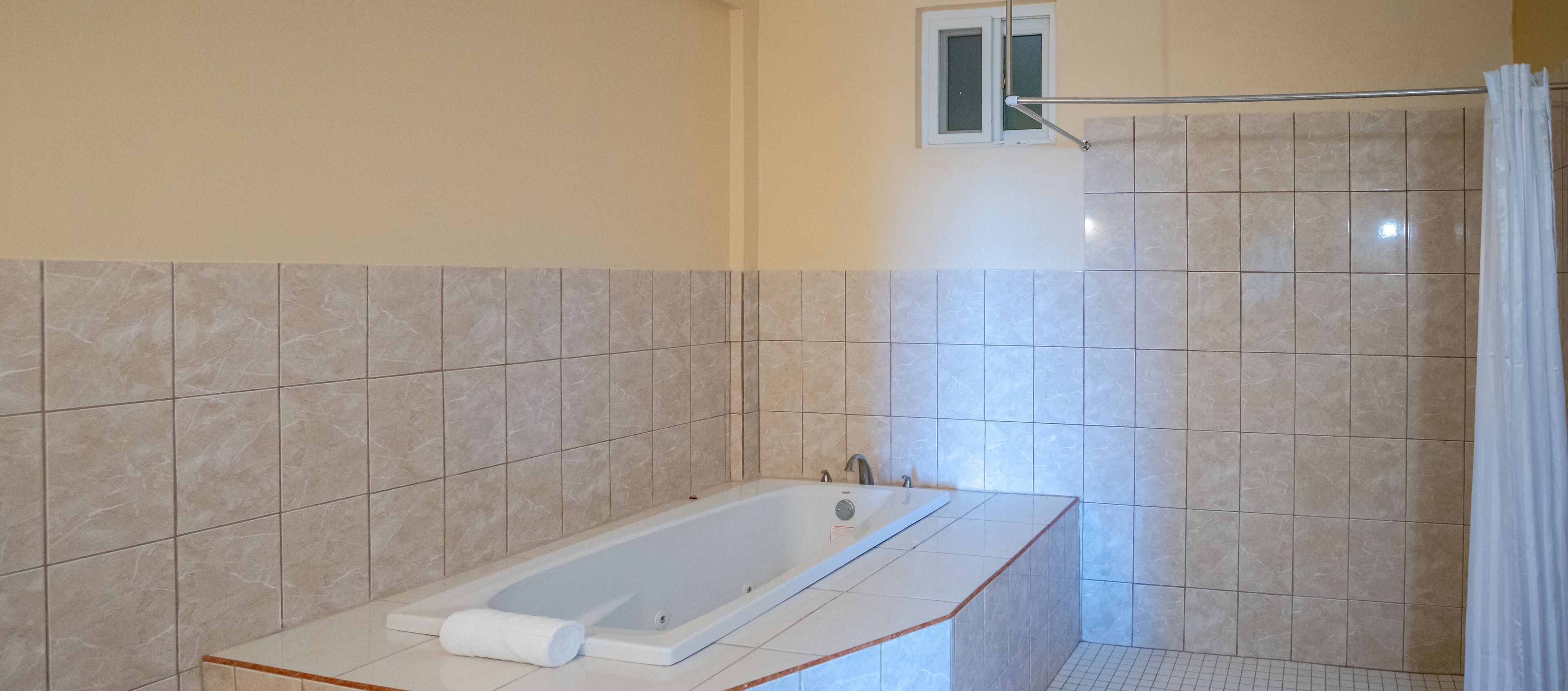 separate bathtub and shower, free toiletries, hair dryer, towels