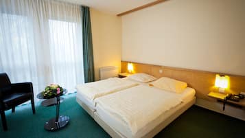 Double Room | Minibar, in-room safe, desk, iron/ironing board
