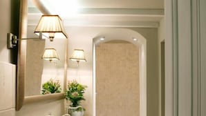 A bathroom with two sinks, a mirror, and a shower area. - Castillo de Arteaga (Gautegiz Arteaga)