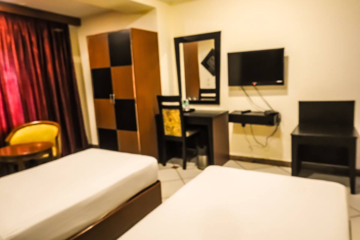Quarto executivo | Frigobar, Wi-Fi de cortesia