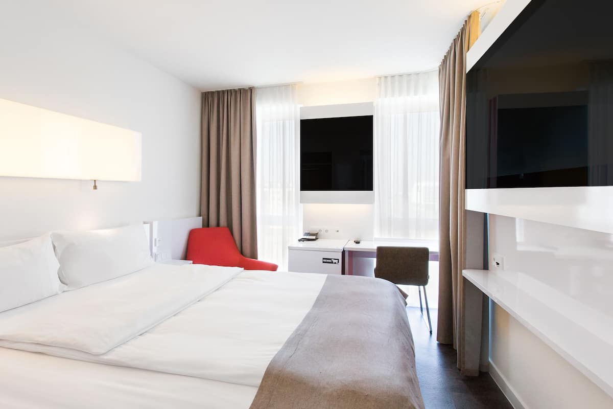 Comfort Double or Twin Room | Free minibar, in-room safe, desk, blackout curtains