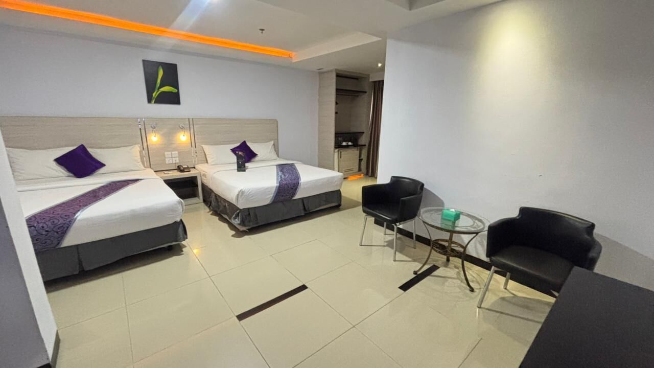 Familienzimmer (VIP Gold) | Minibar, Zimmersafe, Schreibtisch, Zustellbetten