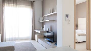 Premium bedding, down duvets, memory-foam beds, minibar