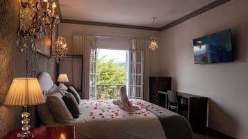 Swiss Master Suite with Fireplace | Egyptian cotton sheets, premium bedding, down duvets, pillow-top beds