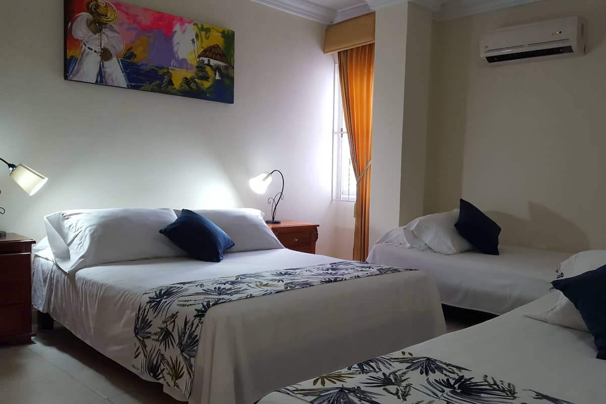 Blackout curtains, iron/ironing board, free WiFi, bed sheets