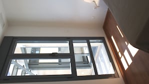 Apartment, 2 Bedrooms (3 pax) | Desk, iron/ironing board, free cots/infant beds, free WiFi - Apartamentos Carmen (Alicante)