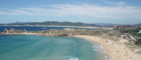 On the beach, white sand, 2 beach bars