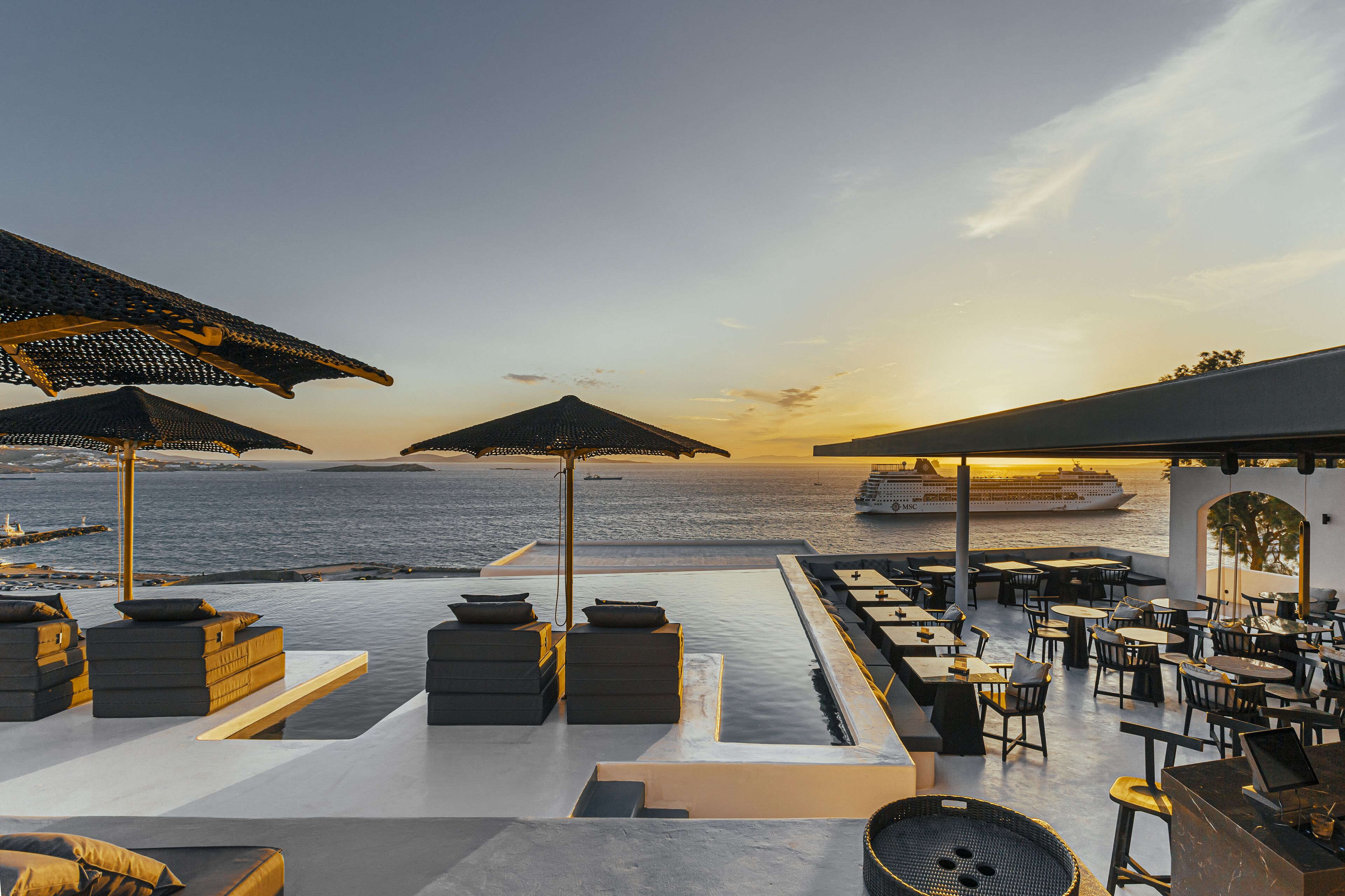 outdoor pool, pool umbrellas, pool loungers