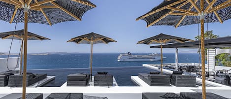 Outdoor pool, pool umbrellas, pool loungers