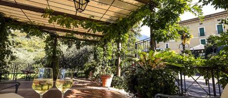 Lunch, dinner served; local cuisine, garden views