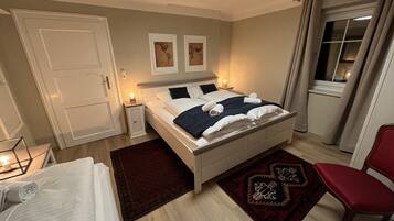 Individually furnished, iron/ironing board, cribs/infant beds