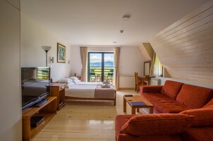 Suite estudio | Minibar, caja fuerte, cunas gratuitas y ropa de cama