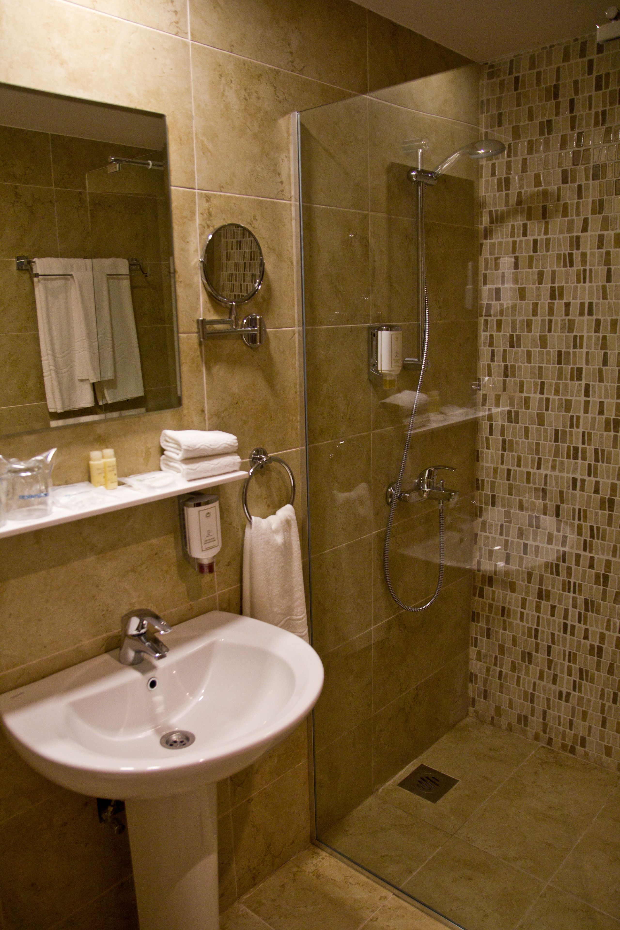 shower, free toiletries, hair dryer, bathrobes