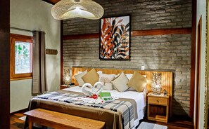 Suite Deluxe | Caja fuerte, decoración individual, mobiliario individual y ropa de cama