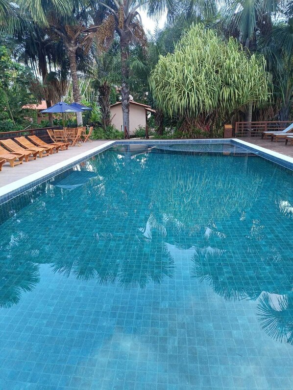 Outdoor pool, free pool cabanas, pool umbrellas