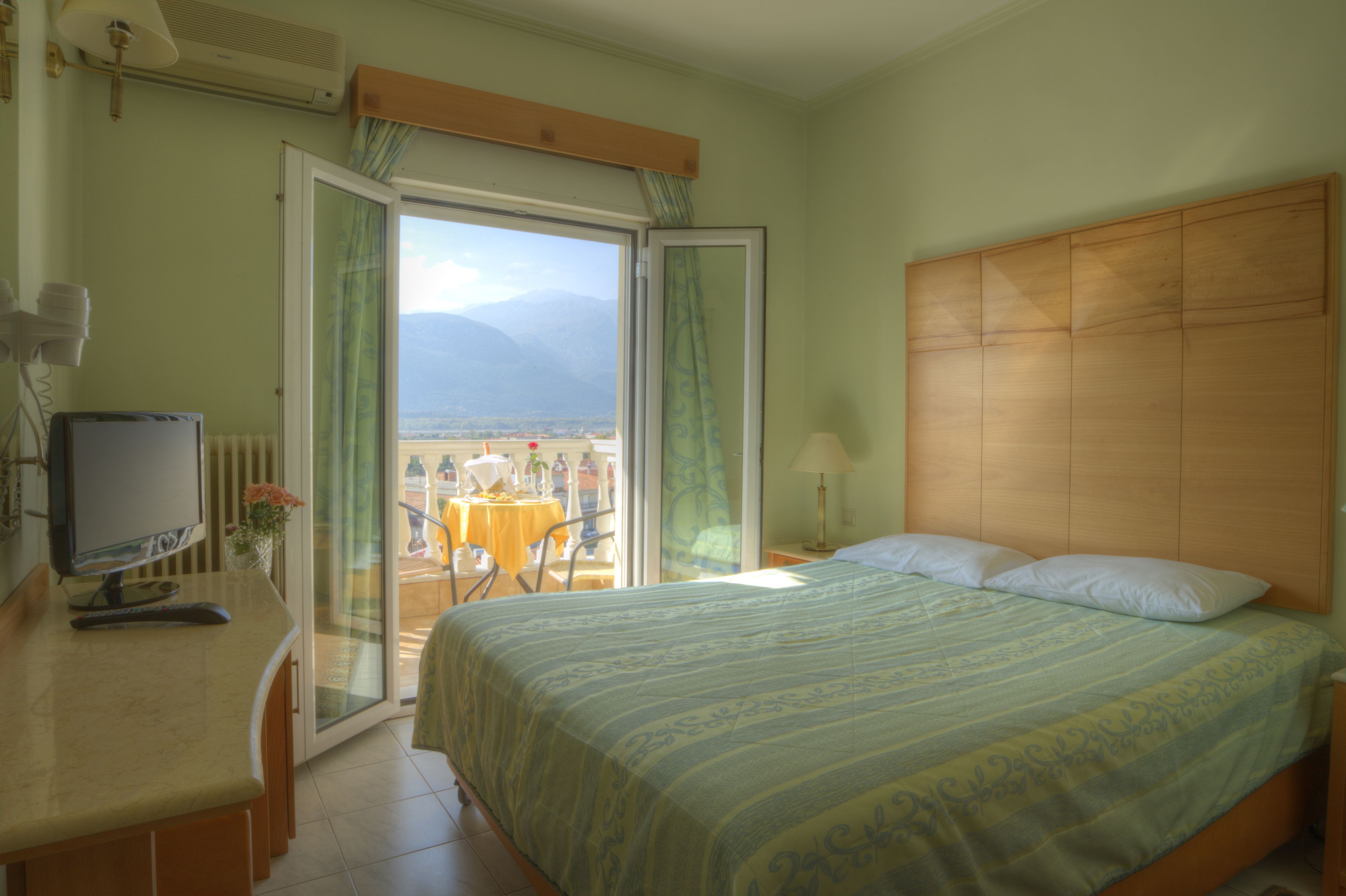 classic double room, 1 double bed, non smoking, mountain view | in-room safe, soundproofing, iron/ironing board, free wifi