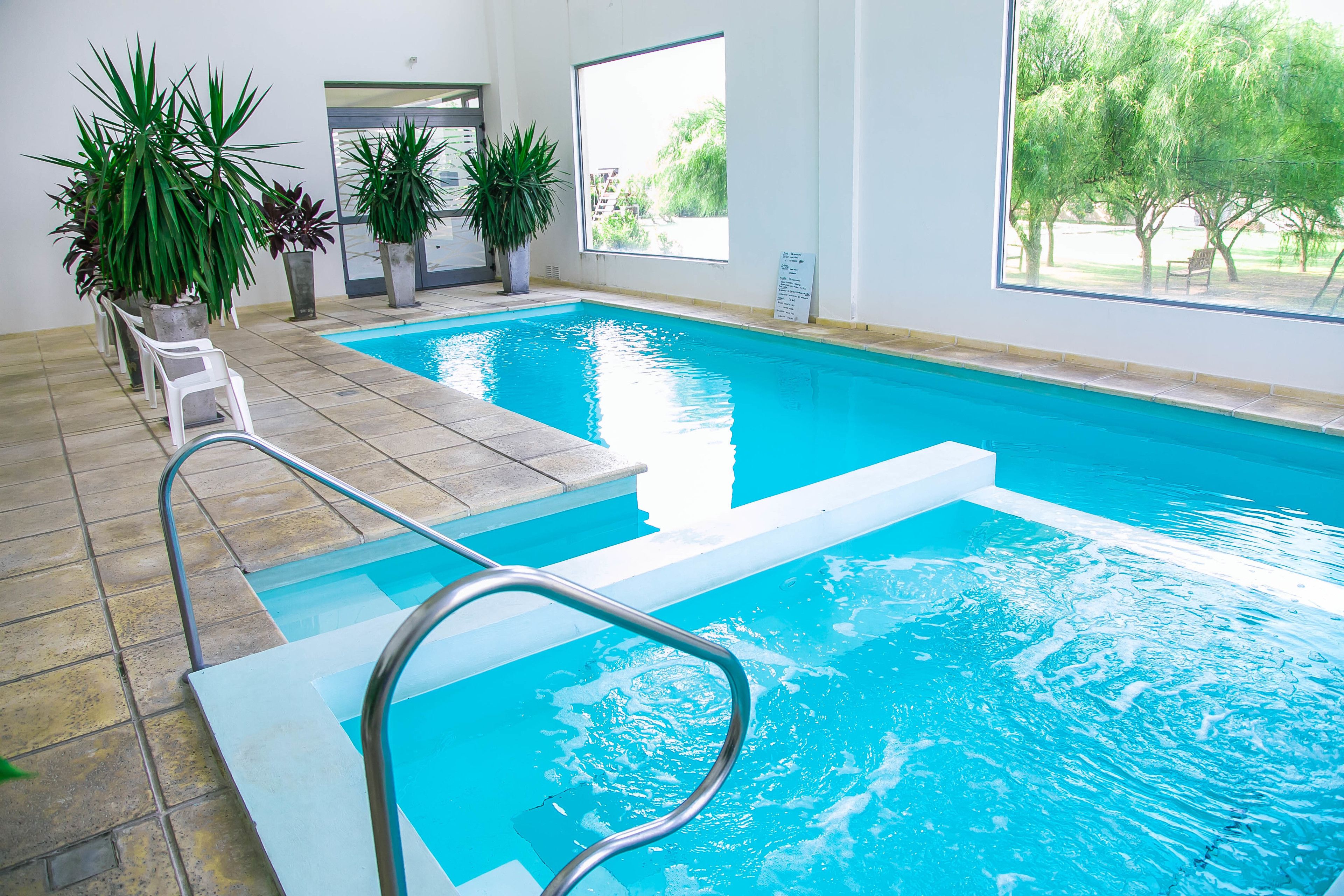 Indoor pool, seasonal outdoor pool, pool umbrellas