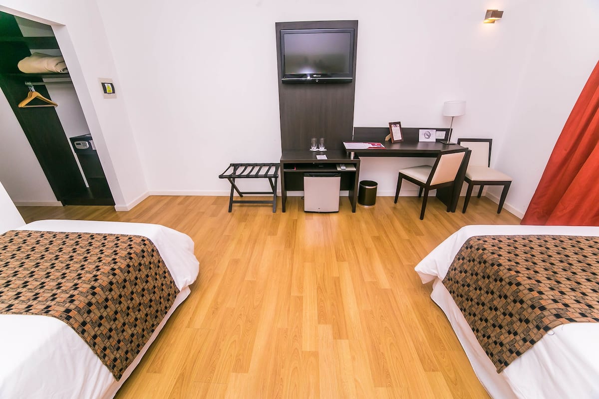 superior room, 2 queen beds | down duvets, minibar, in-room safe, desk