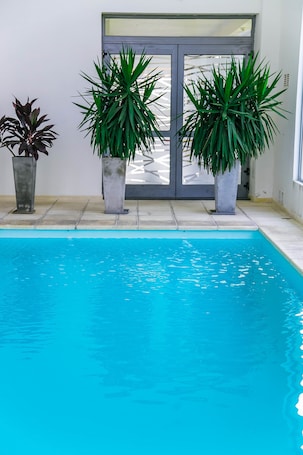 Indoor pool, seasonal outdoor pool, pool umbrellas