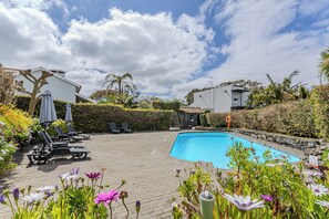 Outdoor pool, pool umbrellas, pool loungers