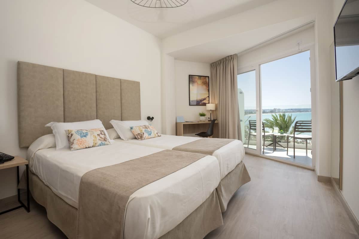 Double or Twin Room, Sea View | Minibar, desk, free WiFi, bed sheets