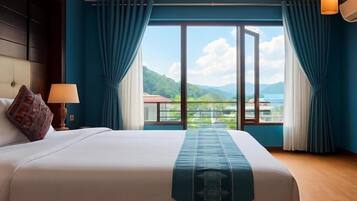 Deluxe Double Room, Mountain View | In-room safe, desk, blackout drapes, iron/ironing board
