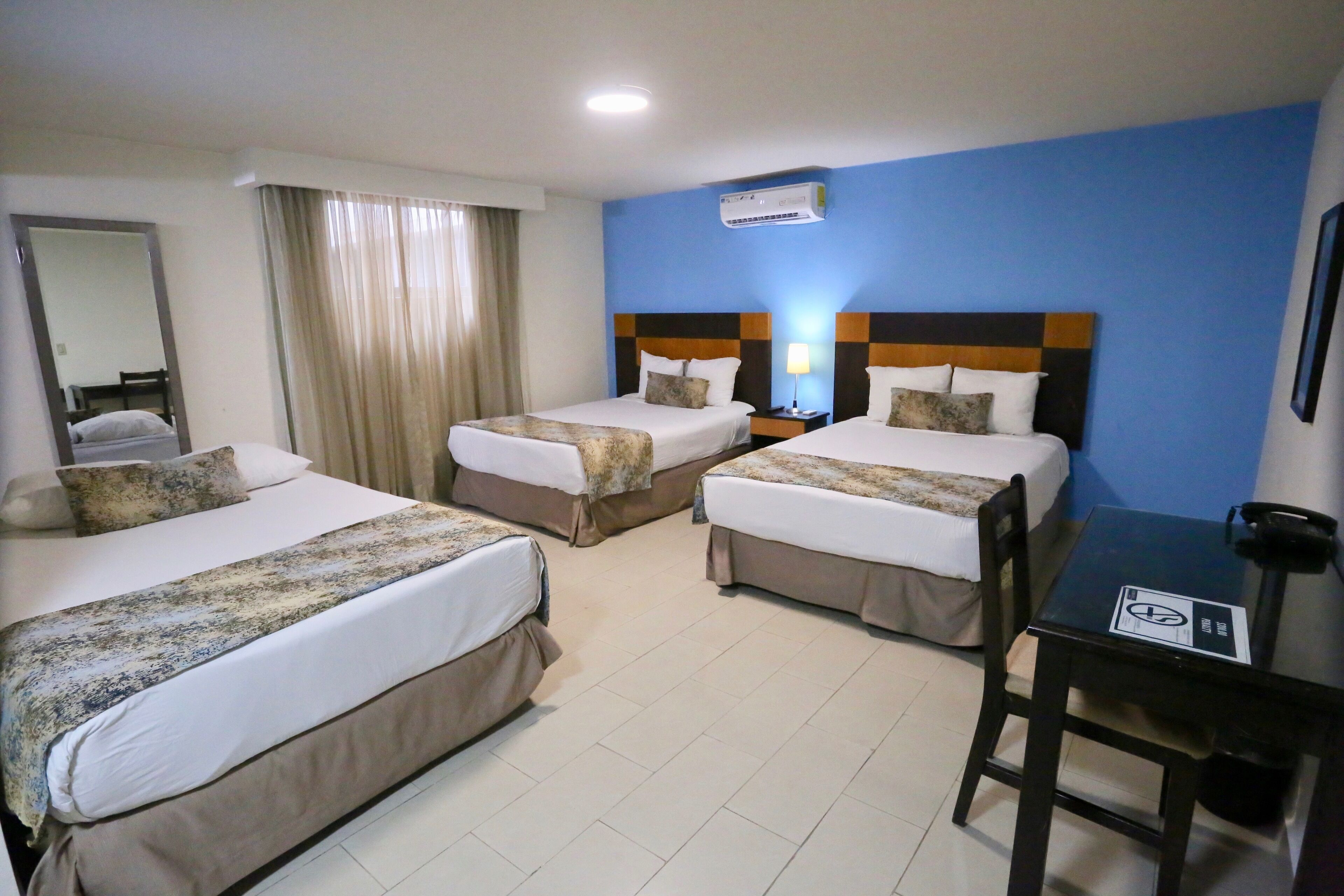 Family Room | Down comforters, individually decorated, individually furnished, desk