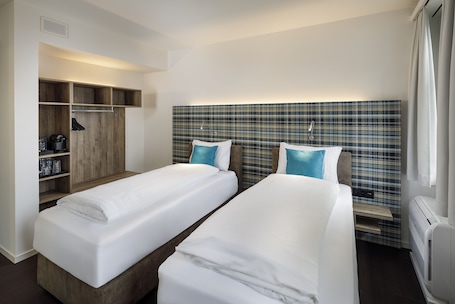 Standard Twin Room | Hypo-allergenic bedding, desk, blackout drapes, free WiFi