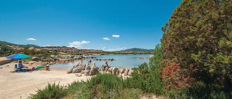 On the beach, white sand, motor boating