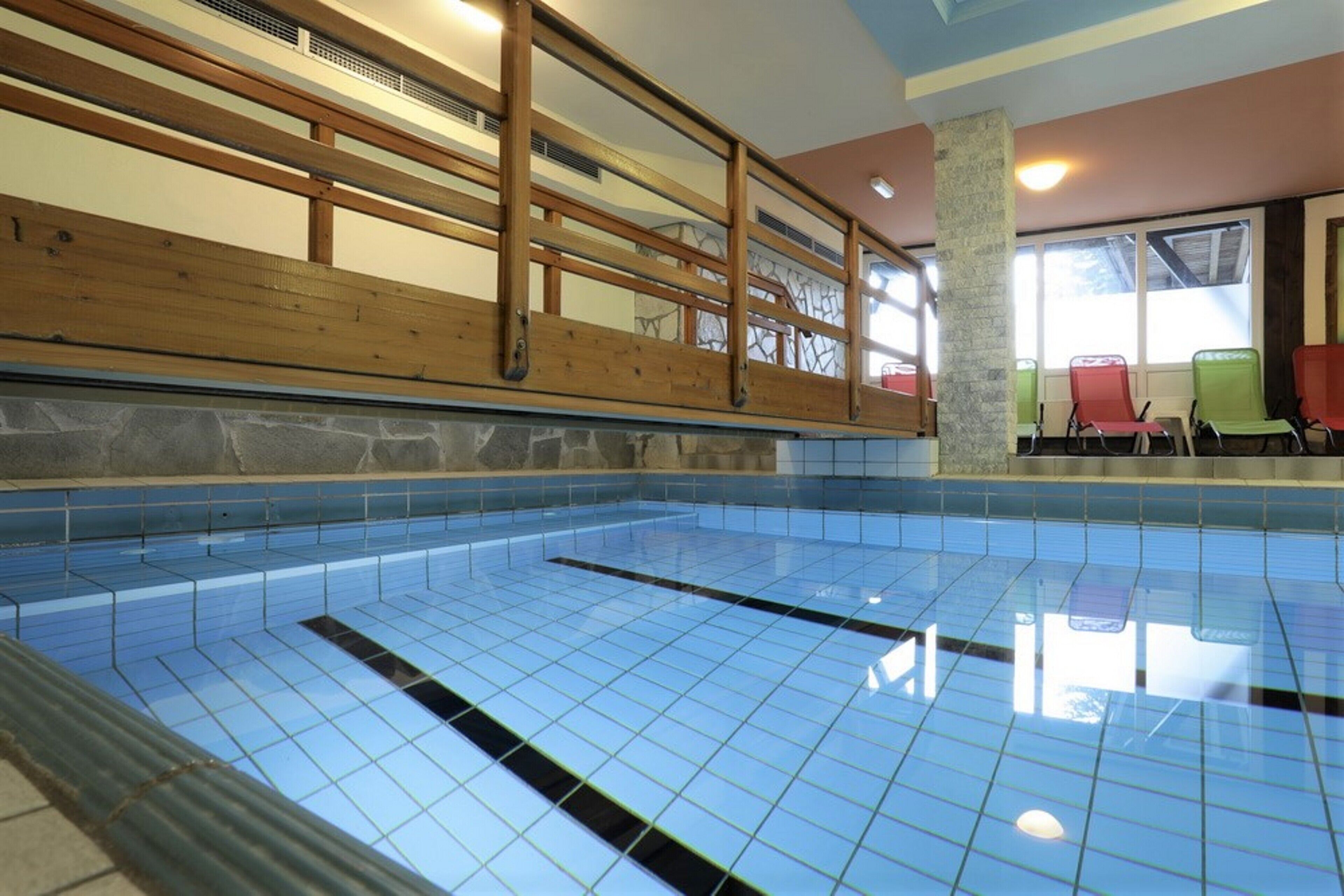 indoor pool, pool loungers
