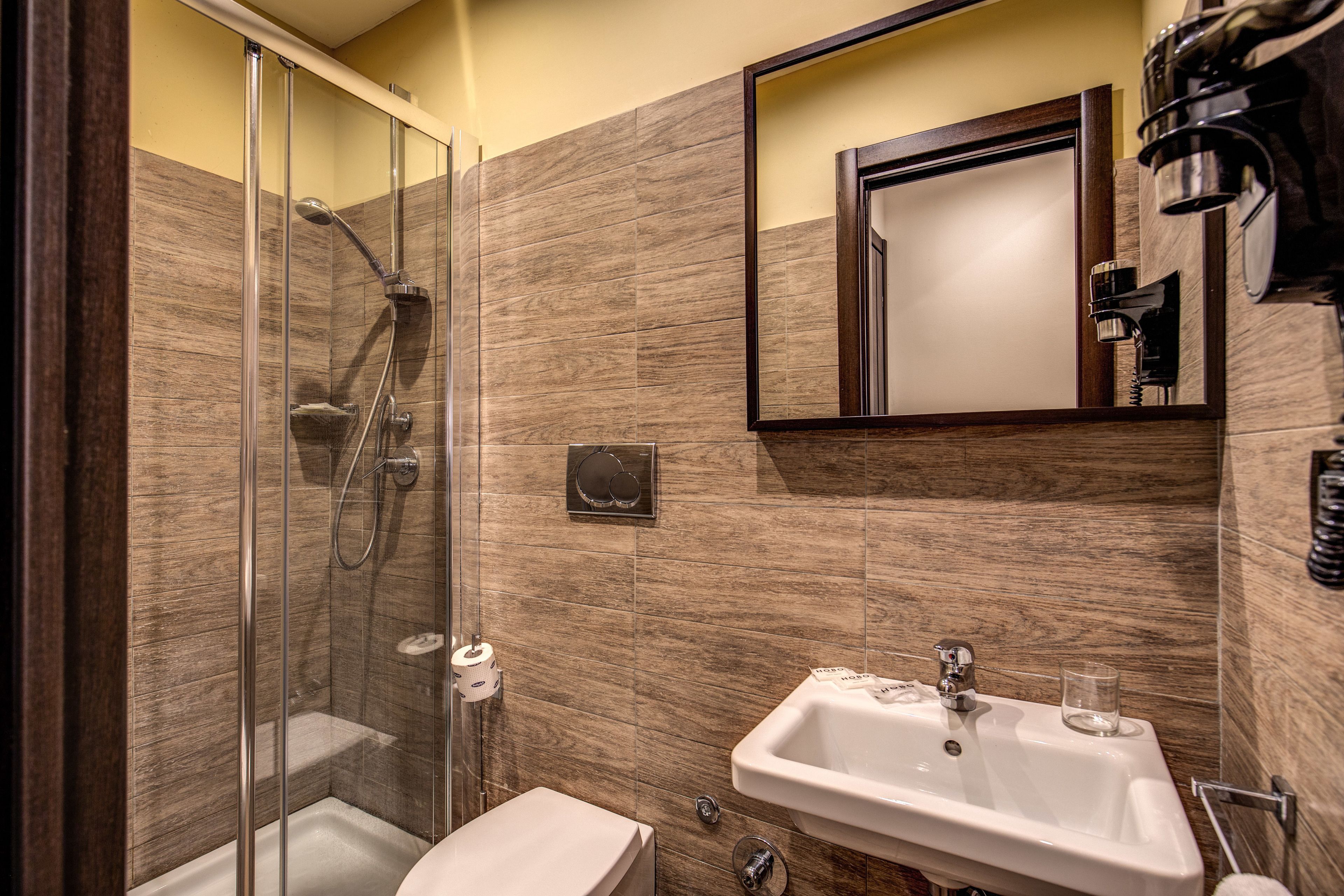 economy double room, no windows | bathroom | shower, free toiletries, hair dryer, slippers