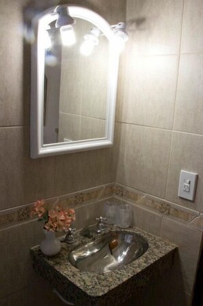 Combined shower/bathtub, deep-soaking bathtub, rainfall showerhead