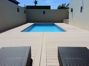 Outdoor pool, pool umbrellas, sun loungers