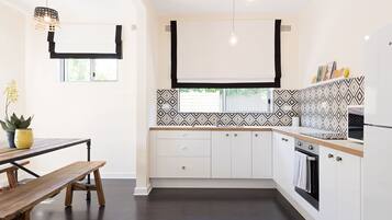 Family Apartment, 2 Bedrooms | Private kitchen | Full-size fridge, microwave, stovetop, coffee/tea maker