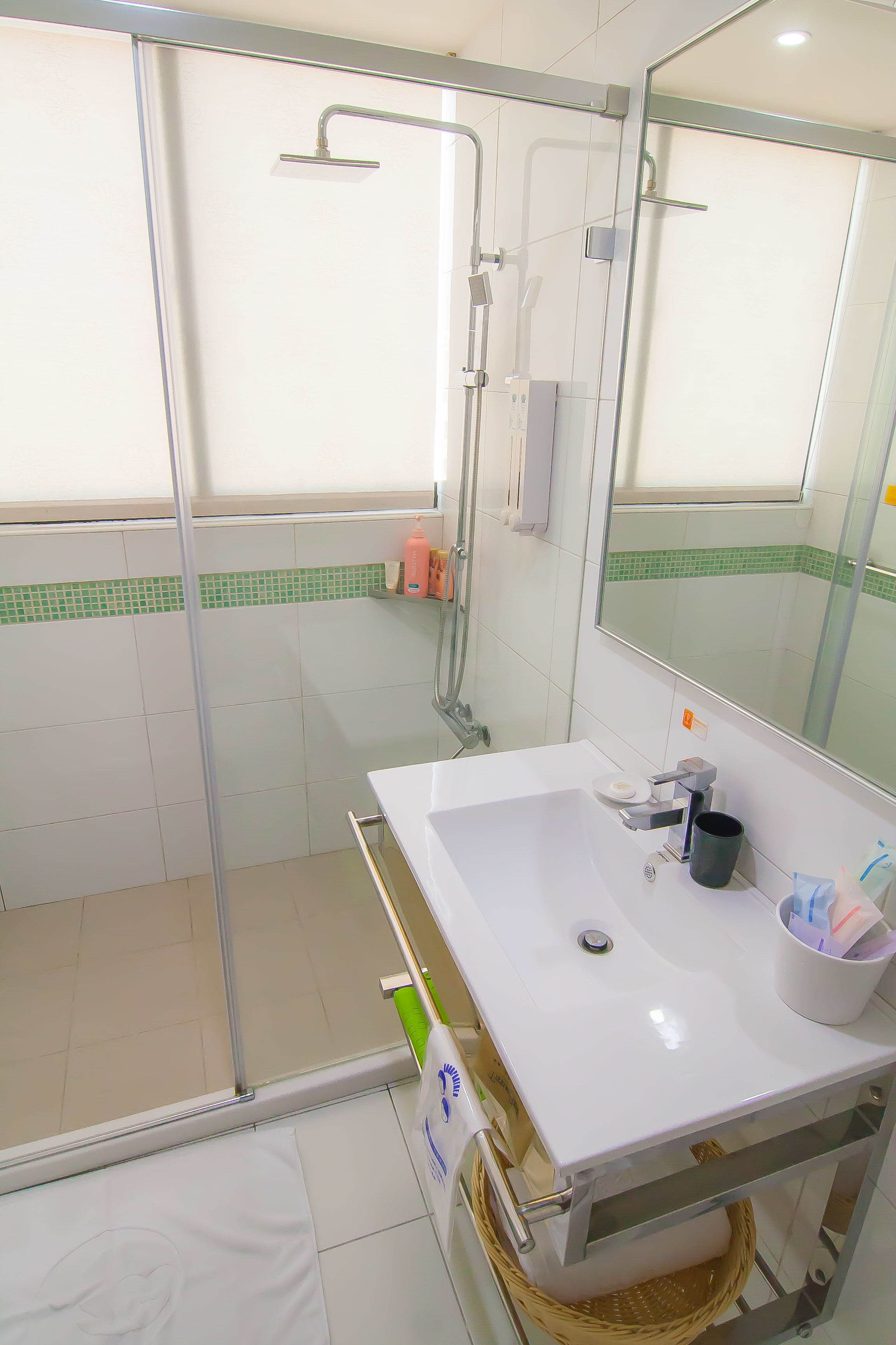 economy single room, 1 large single bed | bathroom | rainfall showerhead, hair dryer, bidet, towels